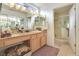 Large bathroom with double vanity and shower at 9921 Woodhouse Dr, Las Vegas, NV 89134