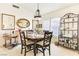 Bright dining area with a round table and charming decor at 9921 Woodhouse Dr, Las Vegas, NV 89134