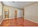 Bedroom with hardwood floors and an ensuite bathroom at 9936 Fountain Walk Ave, Las Vegas, NV 89149