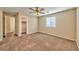 Spacious bedroom with ceiling fan and large closet at 9936 Fountain Walk Ave, Las Vegas, NV 89149