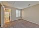 Bedroom with carpet and an ensuite bathroom at 9936 Fountain Walk Ave, Las Vegas, NV 89149