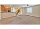 Living room with carpet flooring and a ceiling fan at 9936 Fountain Walk Ave, Las Vegas, NV 89149