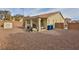 Spacious backyard with covered patio, grill, and storage shed at , Las Vegas, NV 89148