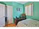 Bright bedroom with wood floors and a large closet at , Las Vegas, NV 89148