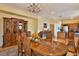 Spacious dining room, featuring a large table and wood hutch at , Las Vegas, NV 89148