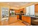 Bright kitchen, featuring wood cabinets, stainless steel appliances, and an island at , Las Vegas, NV 89148