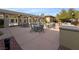 Community patio with tables and chairs near the pool at , Las Vegas, NV 89148