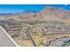 Aerial view of a residential community with houses and desert landscape at 12103 Canyon Sunset St, Las Vegas, NV 89138