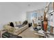 Light-filled home office with couch and workspace at 1909 Pinsky Ln, North Las Vegas, NV 89032