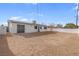 Large backyard with a spacious area and a view of the house at 2028 Hassell Ave, North Las Vegas, NV 89032