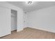 Spacious bedroom with light wood flooring and large closet at 2028 Hassell Ave, North Las Vegas, NV 89032