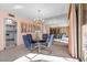 Bright dining area with a glass table and chandelier at 205 E Harmon Ave # 707, Las Vegas, NV 89169