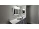 Bathroom featuring a vanity with a vessel sink and a large mirror at 2300 E Silverado Ranch Blvd # 1151, Las Vegas, NV 89183