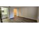 Bright bedroom with wood-look flooring and a large closet at 2300 E Silverado Ranch Blvd # 1151, Las Vegas, NV 89183