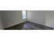 Bright bedroom with wood-look floors and large window at 2300 E Silverado Ranch Blvd # 1151, Las Vegas, NV 89183