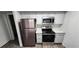 Modern kitchen with stainless steel appliances and white cabinets at 2300 E Silverado Ranch Blvd # 1151, Las Vegas, NV 89183