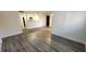 Living room with hardwood floors and access to patio at 2300 E Silverado Ranch Blvd # 1151, Las Vegas, NV 89183