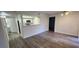 Bright living room with kitchen and hardwood floors at 2300 E Silverado Ranch Blvd # 1151, Las Vegas, NV 89183