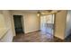 Living room with hardwood floors, patio access, and ceiling fan at 2300 E Silverado Ranch Blvd # 1151, Las Vegas, NV 89183
