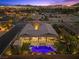 Luxury home with pool and spa, aerial view at dusk at 286 Chartan Ave, Las Vegas, NV 89183