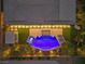 Bird's eye view of a home with a large pool and spa at 286 Chartan Ave, Las Vegas, NV 89183