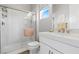 Elegant bathroom with a walk-in shower, vanity, and window at 286 Chartan Ave, Las Vegas, NV 89183