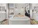 Luxurious bathroom with a soaking tub, double vanity, and modern fixtures at 286 Chartan Ave, Las Vegas, NV 89183