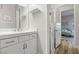 Modern bathroom features a vanity with white cabinets and a walk-in shower at 286 Chartan Ave, Las Vegas, NV 89183