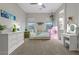 Bright bedroom featuring a daybed, dresser, and plenty of natural light at 286 Chartan Ave, Las Vegas, NV 89183