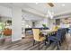 Elegant dining room with large table, modern lighting, and stylish chairs at 286 Chartan Ave, Las Vegas, NV 89183