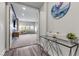 Bright entryway with a view into the living room and a stylish console table at 286 Chartan Ave, Las Vegas, NV 89183