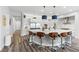 Modern kitchen with large island, stainless steel appliances, and white cabinets at 286 Chartan Ave, Las Vegas, NV 89183