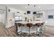 Modern kitchen with large island, stainless steel appliances, and white cabinets at 286 Chartan Ave, Las Vegas, NV 89183