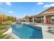 Inviting pool and spa with spacious patio and seating at 286 Chartan Ave, Las Vegas, NV 89183