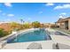 Luxury pool and spa with patio seating at 286 Chartan Ave, Las Vegas, NV 89183