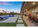 Stunning pool and spa at sunset with expansive patio at 286 Chartan Ave, Las Vegas, NV 89183