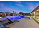 Luxury pool and spa at dusk with comfortable loungers at 286 Chartan Ave, Las Vegas, NV 89183