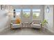 Relaxing sitting area with two mid-century modern armchairs and natural light at 286 Chartan Ave, Las Vegas, NV 89183