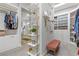 Large walk-in closet with open shelving, drawers, and hanging rods at 286 Chartan Ave, Las Vegas, NV 89183