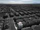 Wide aerial view showcasing the home and surrounding landscape at 2905 Bahama Yellow Ave, North Las Vegas, NV 89086