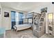 Bright bedroom with built-in bunk beds and ample storage at 2905 Bahama Yellow Ave, North Las Vegas, NV 89086