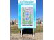 Sign displaying Watercolor Community Park amenities, including a pool at 2905 Bahama Yellow Ave, North Las Vegas, NV 89086