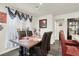 Elegant dining room with dark wood table and leather chairs at 2905 Bahama Yellow Ave, North Las Vegas, NV 89086