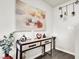 Elegant entryway with a console table and tasteful wall art at 2905 Bahama Yellow Ave, North Las Vegas, NV 89086