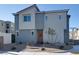 Two-story house with gray siding, landscaped yard, and a walkway leading to the front door at 2905 Bahama Yellow Ave, North Las Vegas, NV 89086