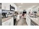 Open concept kitchen with stainless steel appliances and a view into the living area at 2905 Bahama Yellow Ave, North Las Vegas, NV 89086