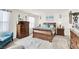 Spacious main bedroom with wood furniture and soft color palette at 2905 Bahama Yellow Ave, North Las Vegas, NV 89086