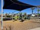 Modern playground with shade structure and play equipment at 2905 Bahama Yellow Ave, North Las Vegas, NV 89086