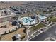 Community pool with surrounding lounge areas and landscaping at 2905 Bahama Yellow Ave, North Las Vegas, NV 89086