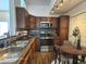 Modern kitchen with stainless steel appliances and dark wood cabinets at 3150 Soft Breezes Dr # 2214, Las Vegas, NV 89128